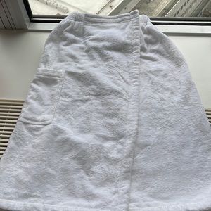 Brand new never worn Frette towel wrap with Velcro closure to wear after shower